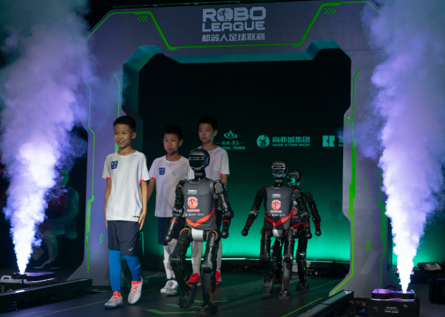 AI humanoid robot dribbling football at RoBoLeague 2025 event
